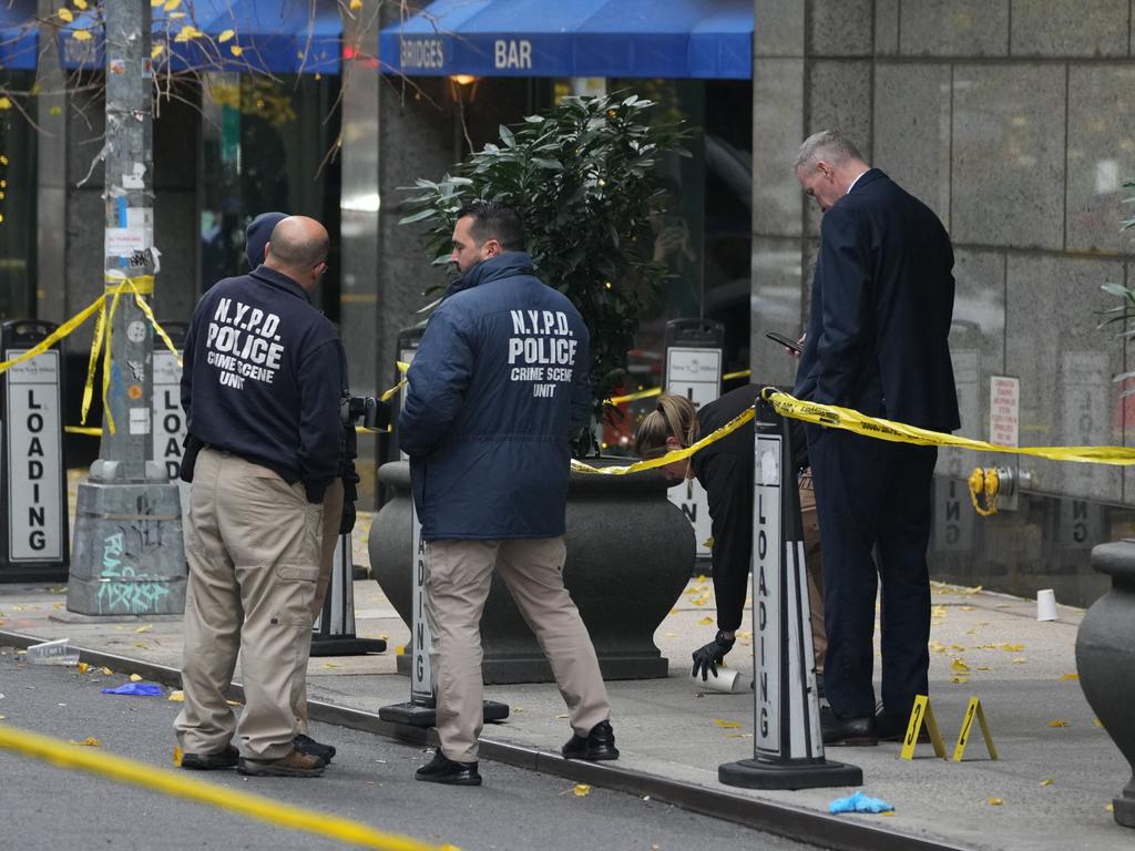 Crime Scene Unit police work at the scene. Picture: Bryan R. SMITH / AFP