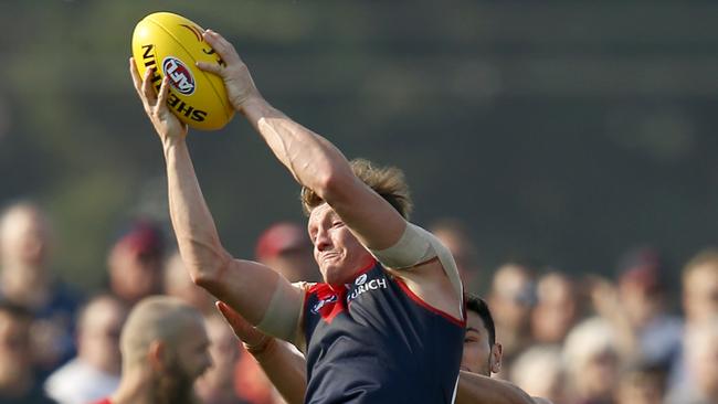 Aaron Vandenberg takes a strong mark against the Lions. Picture: Darrian Traynor/Getty Images