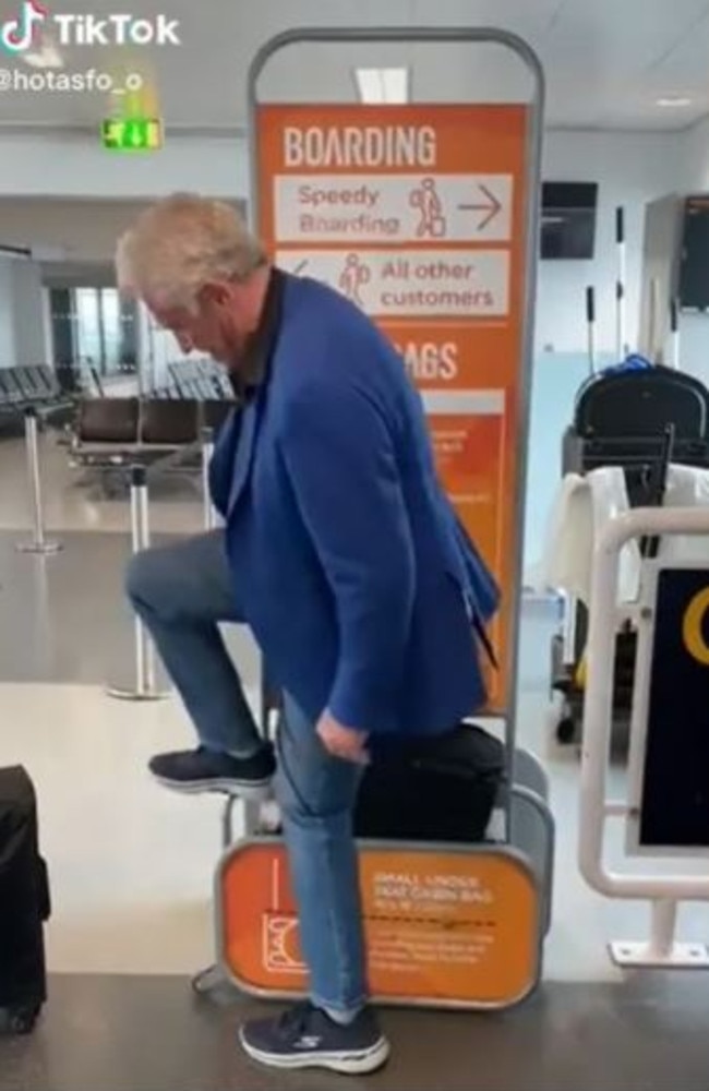 The man’s bag was then wedged in the size checker. Picture: TikTok