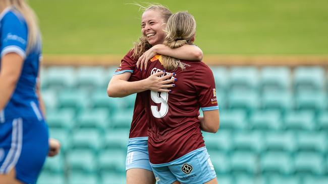 Ashlie Crofts celebrated her first goal of the season with teammate Brinley Gentle. Picture: Julian Andrews