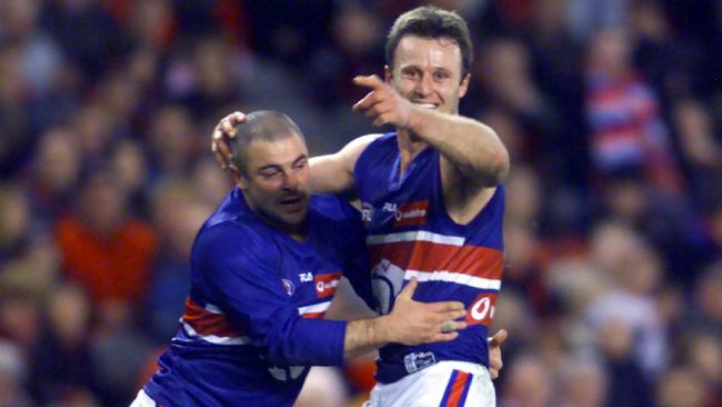 Chris Grant celebrates his match-winning goal with Steven Kolyniuk. Picture: Michael Dodge