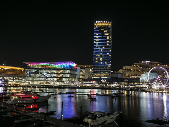 Landmark buildings, such as the International Convention Centre in Darling Harbour, will be lit up. Picture: Dylan Robinson