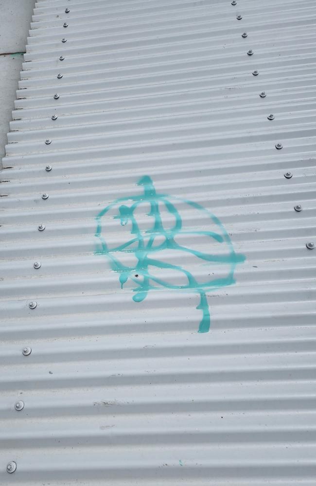 Graffiti on the roof of PNE Art and Framing in the Rockhampton CBD. Picture: Contributed