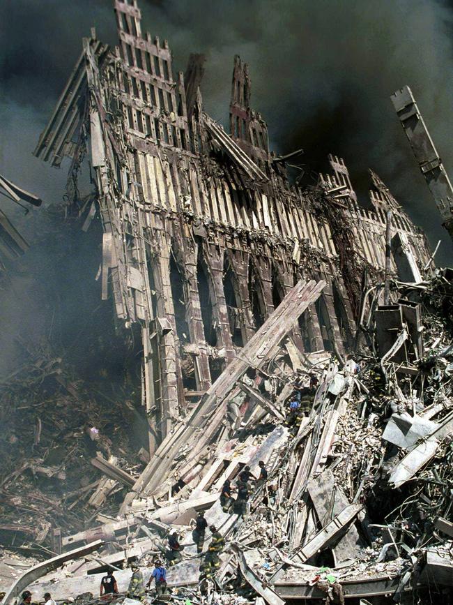 Firefighters form a human chain in a bid to rescue citizens from the rubble of World Trade Center in New York. Picture: File