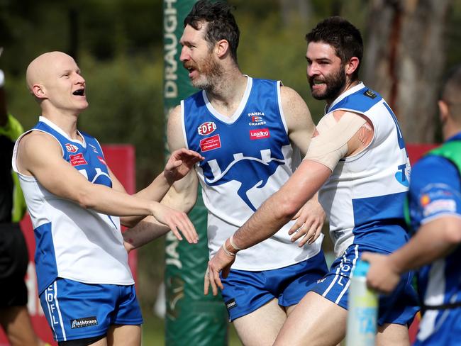 Josh Burgess (right) celebrates a goal for Sunbury Kangaroos. Picture: Mark Dadswell