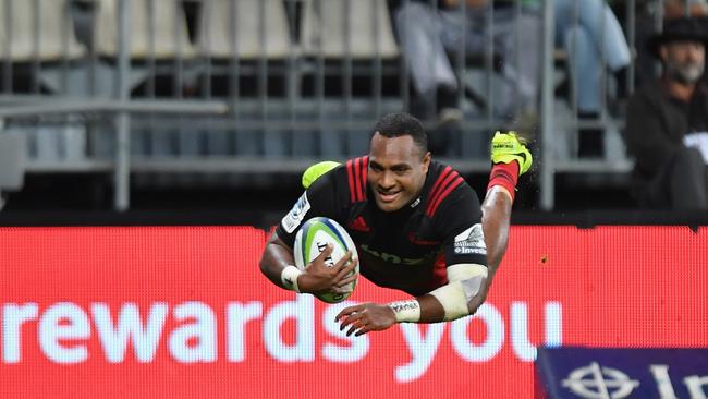 Manasa Mataele of the Crusaders dives over to score a try.