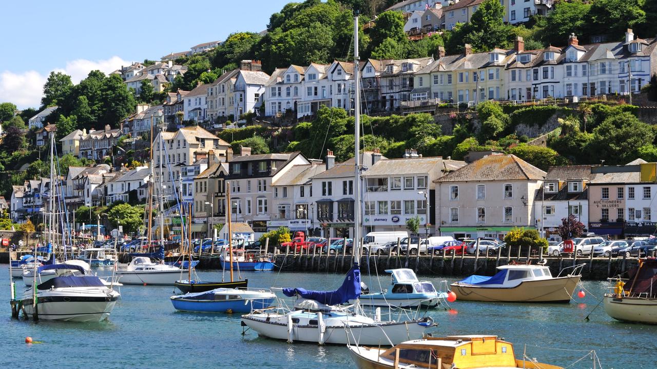 Boats in the estuary at Looe, Cornwall, UK, near where the Snooty Fox sits. Picture: Alamy