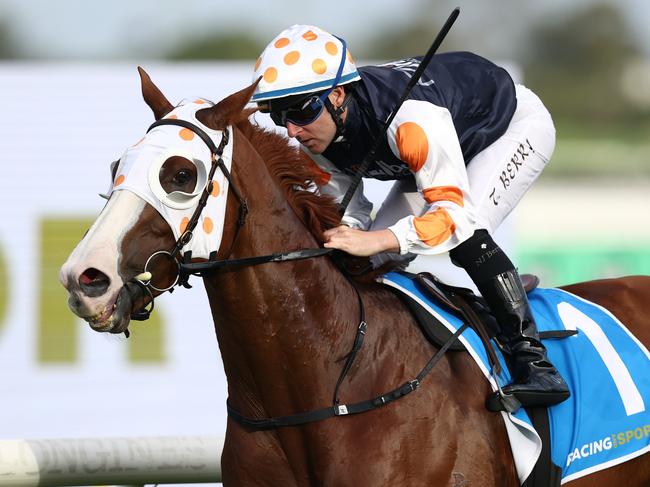 SYDNEY, AUSTRALIA - APRIL 01: Tommy Berry riding Just Folk wins Race 9 The Racing and Sports Doncaster Prelude during Sydney Racing at Rosehill Gardens on April 01, 2025 in Sydney, Australia. (Photo by Jason McCawley/Getty Images)