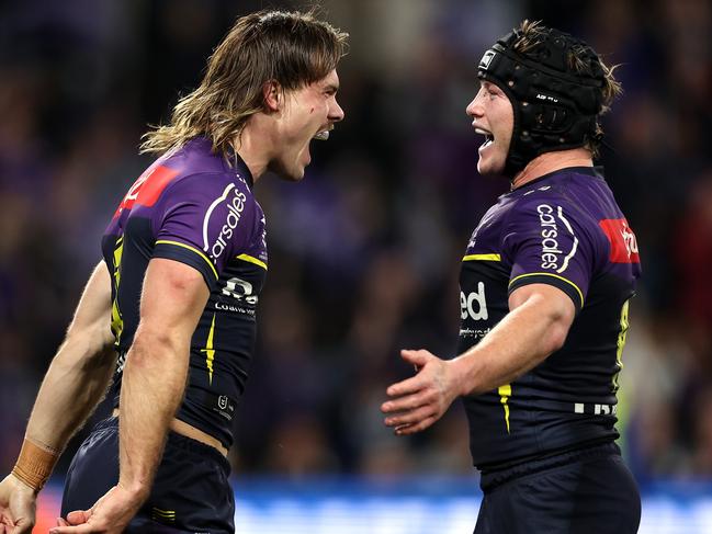 Ryan Papenhuyzen and Harry Grant celebrate. Picture: Cameron Spencer/Getty Images