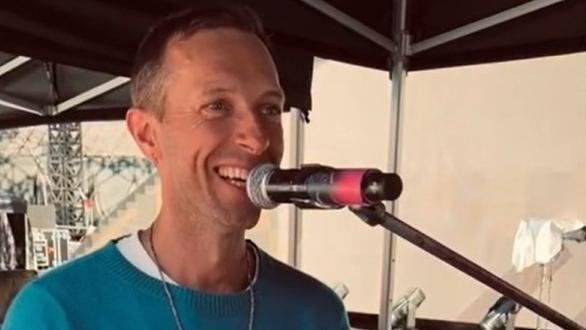 Coldplay's Chris Martin plays the Neighbours theme during a warm up gig in Melbourne