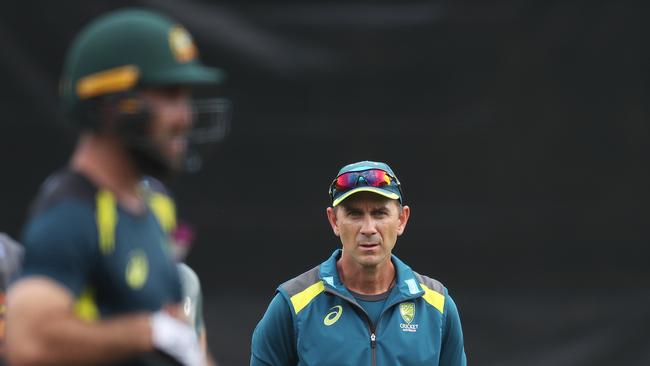 Australian coach Justin Langer watches over Glenn Maxwell in the nets. Picture: Brett Costello