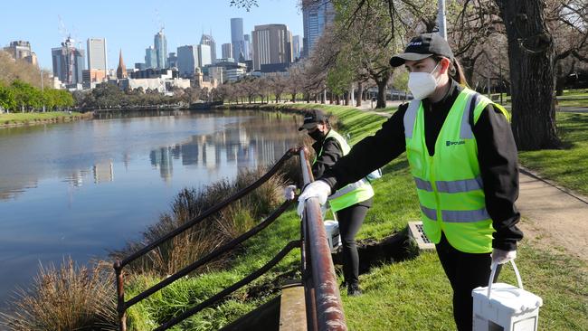 COVID-19 cleaners in Birrarung Marr park during Melbourne’s stage four COVID-19 lockdown. Picture: NCA NewsWire/David Crosling