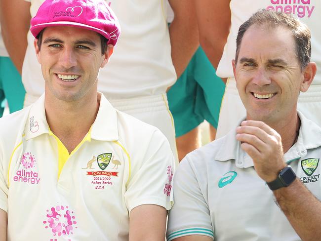 SYDNEY, AUSTRALIA - JANUARY 03: Australian captain Pat Cummins talks to head coach Justin Langer during the Australian team photo during an Australian nets session at Sydney Cricket Ground on January 03, 2022 in Sydney, Australia. (Photo by Mark Metcalfe/Getty Images)