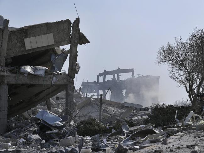 Smoke rises from the damage of the Syrian Scientific Research Centre after the air strikes.