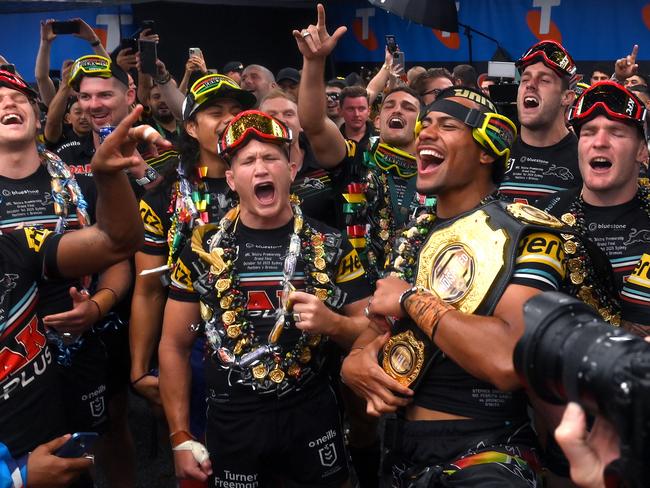 The Panthers players and coaching staff celebrate victory in their dressing room with close friends and family. Picture: Bradley Kanaris/Getty Images