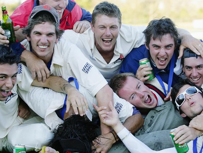 An 18-year-old James Nanopoulos (bottom right) and Dandenong teammates celebrate the 2006-07 premiership.