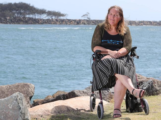 Kelly Fletcher has helped to clean up the Gold Coast's waterways over the years, but now needs help after a stroke. Friends have setup Go Fund Me page. Kelly Fletcher  surrounded by friends at the Spit. Glenn Hampson