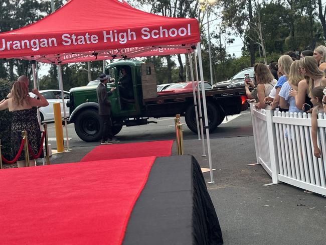 Students from Urangan State High School arrive at their formal.