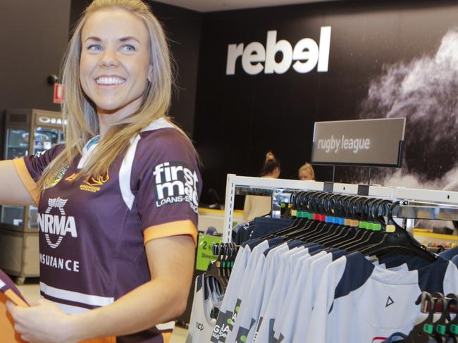 BRISBANE -JULY 25.Rebel Sport customer Erin Fisher shops in the new store at Westfield Chermside. PHOTO-AAP/ TIM MARSDEN