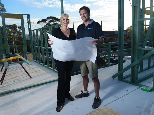 Johanna Griggs and husband, builder Todd Huggins on a building site in Collaroy. Picture: John Fotiadis