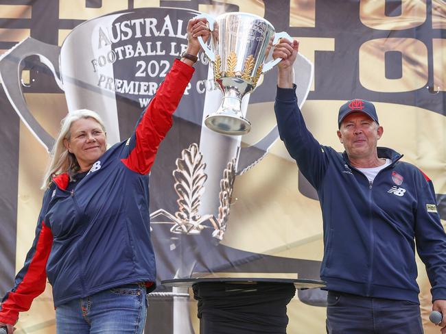 Kate Roffey and Gary Pert lift the premiership cup in 2021. Picture: Michael Klein