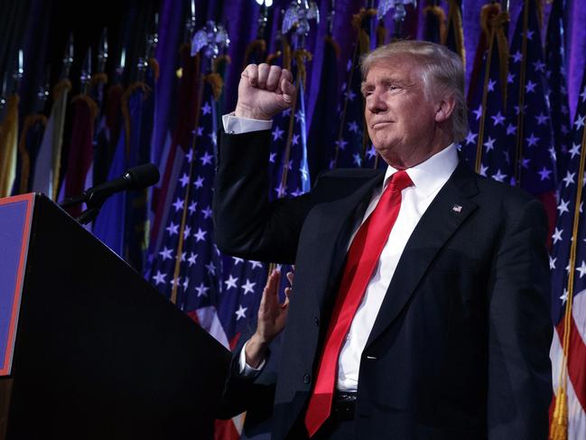 President-elect Donald Trump pumps his fist during an election night rally, Wednesday, Nov. 9, 2016, in New York. (AP Photo/ Evan Vucci)