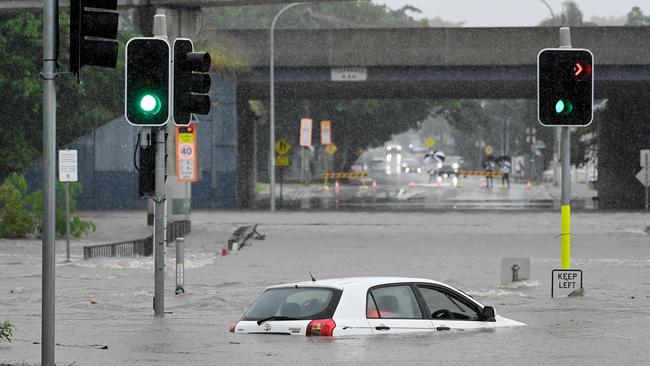 Scenes in Brisbane on Friday. Picture: NCA Newswire / John Gass