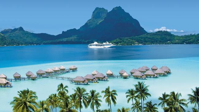 A Paul Gaugin Cruises ship at anchor at Bora Bora in French Polynesia. Picture: Minoru "Mike" Masujima