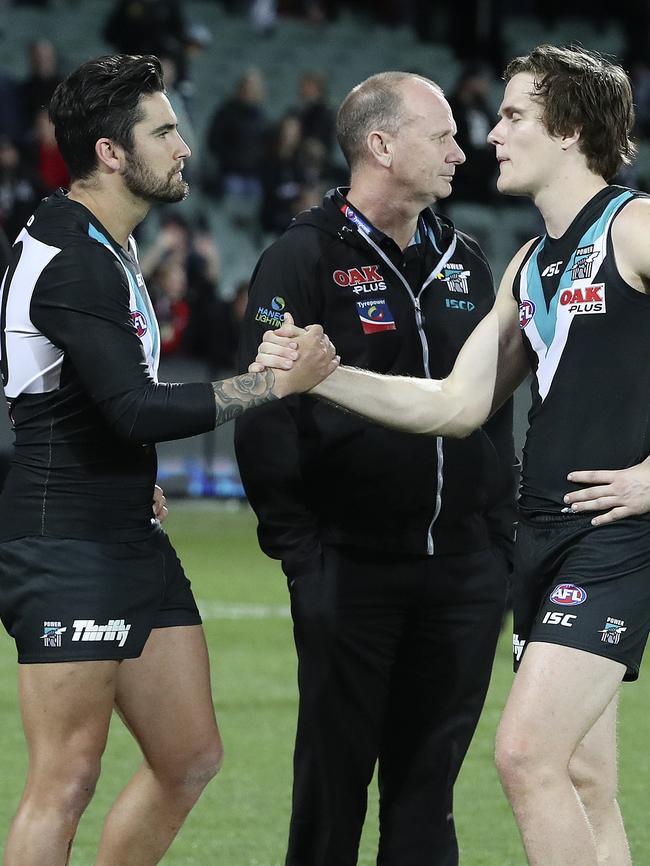 Chad Wingard with Ken Hinkley and Jared Polec, who is being lured to Victoria. Picture Sarah Reed