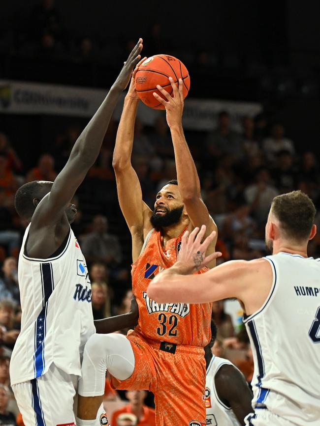 CAIRNS, AUSTRALIA - SEPTEMBER 28: Pedro Bradshaw of the Taipans goes to the basket under pressure during the round two NBL match between Cairns Taipans and Adelaide 36ers at Cairns Convention Centre, on September 28, 2024, in Cairns, Australia. (Photo by Emily Barker/Getty Images)