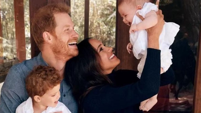 Harry and Meghan pose for their Christmas card last year with Archie and Lilibet.