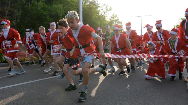 Runners take off for the start of the Variety Santa Fun Run. Picture: (A)manda Parkinson