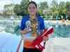Junior swimmer takes out championships with eight golds