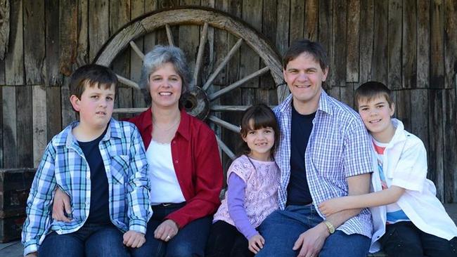 A family photograph shows Luke (left) with his parents and siblings, Lauren, 7, and Luke, 11.