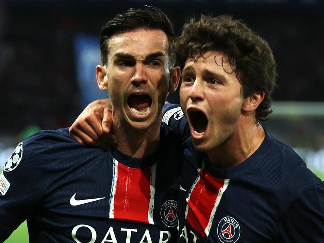 Paris Saint-Germain's Fabian Ruiz (L) celebrates with his teammate Joao Pedro Goncalves Neves. Picture: AFP