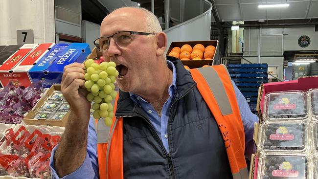 Noel Greenhalgh working his Brisbane fruit market. Picture: Ben Dorries.