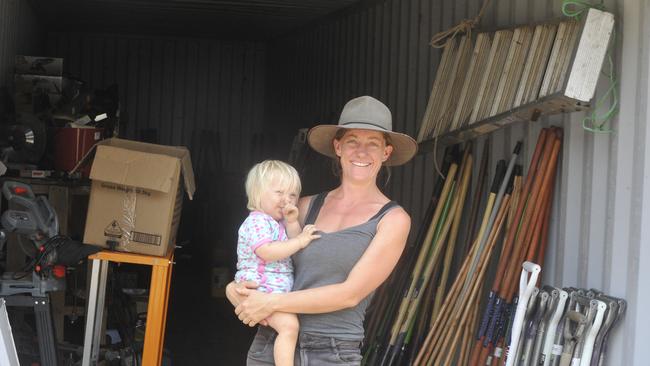 Georgia Foster Eyles with her daughter, Maisy, at Nymboida's tool library that she and other volunteers helped establish.