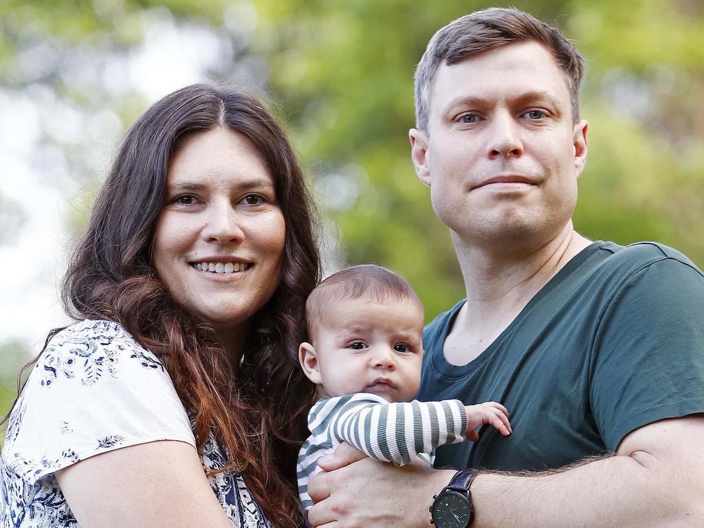 Peter Dixon with wife Jenna Walters and their son Theo at Brookvale today. Peter is battling melanoma and will participate in a world-first immunotherapy trial. Picture: Sam Ruttyn