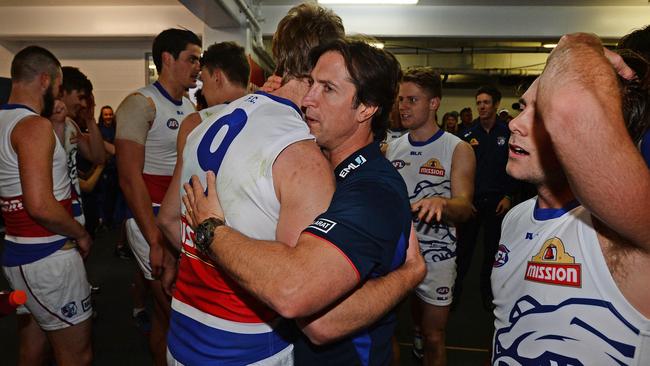 Luke Beveridge and Jake Stringer embrace. Picture: Daniel Wilkins