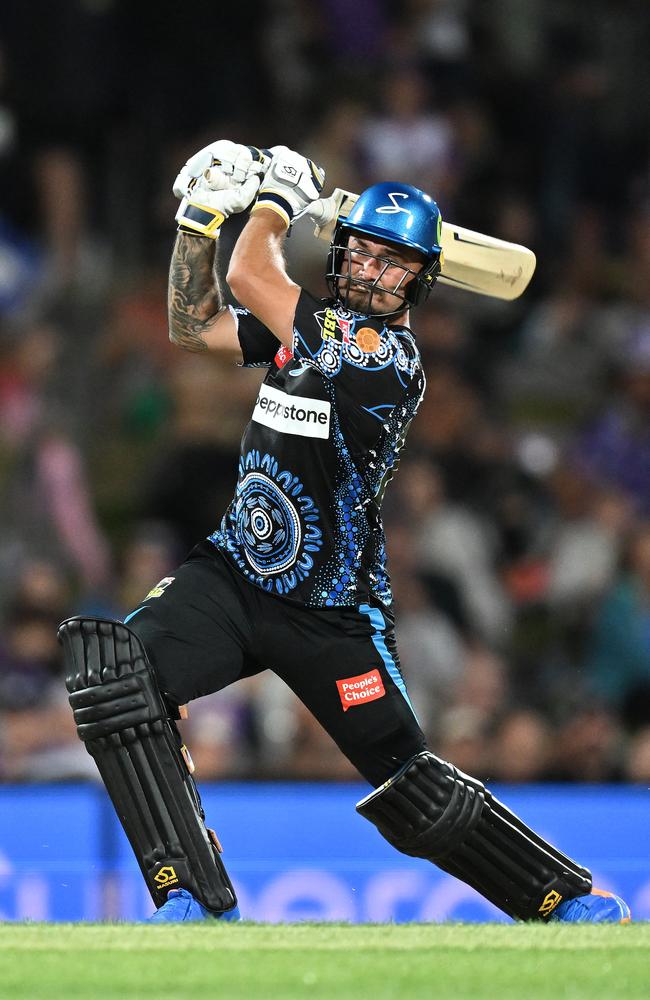 Jake Weatherald of the Strikers hits a boundary against Hobart. Picture: Steve Bell/Getty Images.