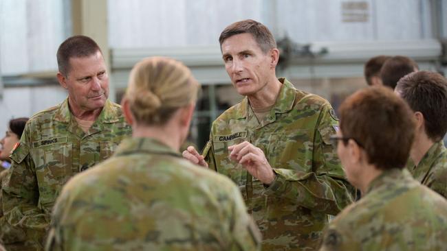 Major General Angus Campbell with Army personnel during their visit to Australia’s main operating base in the Middle East region.