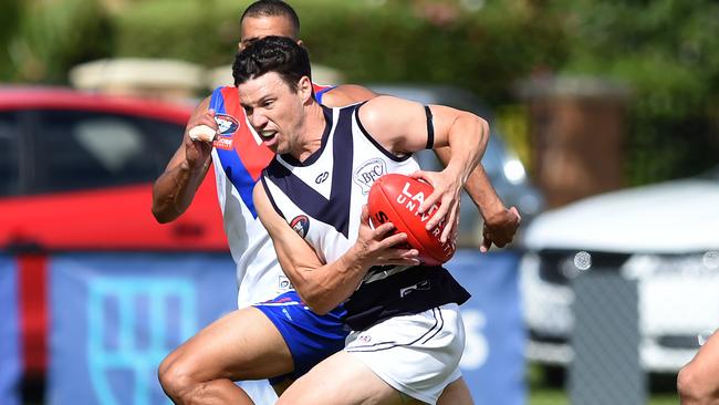 Brendan Carlyon under pressure. Picture: Steve Tanner