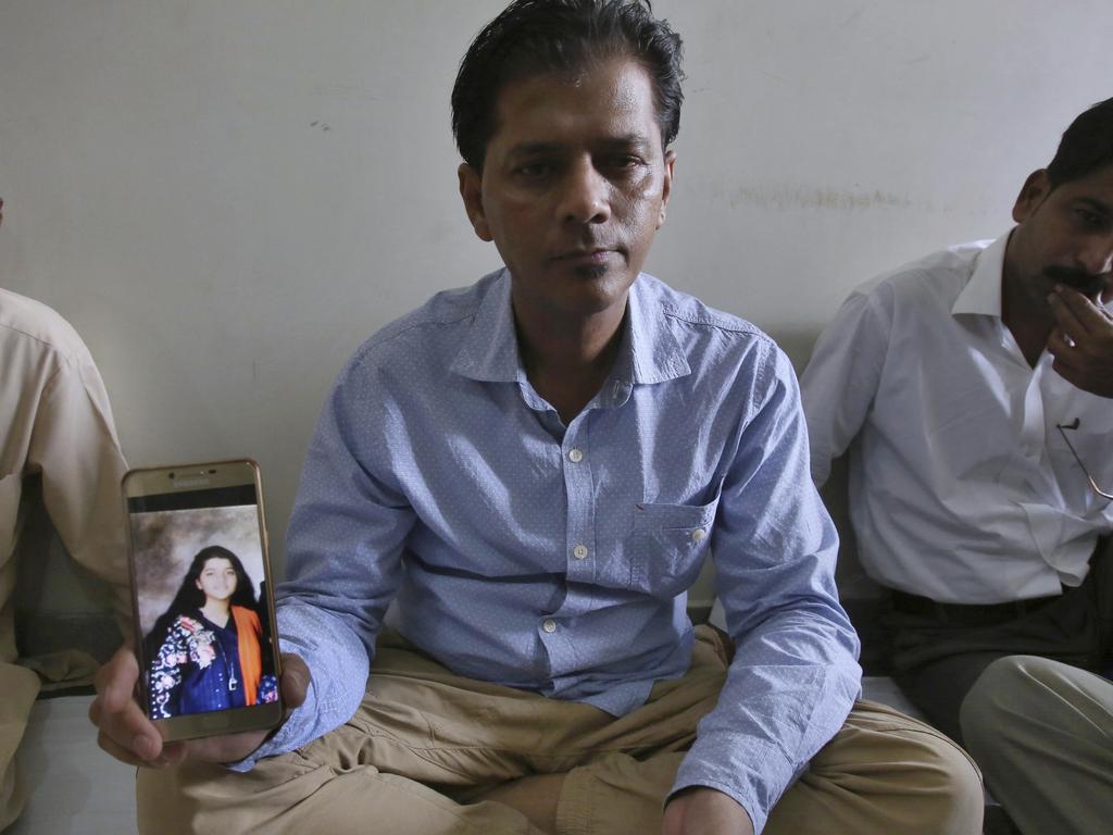 Abdul Aziz Sheikh, father of Sabika Sheikh, was half way across the world in Pakistan, where he struggled to find out that his daughter was among the dead. He was eventually told by the Kennedy-Lugar Youth Exchange &amp; Study Abroad program. (AP Photo/Fareed Khan)