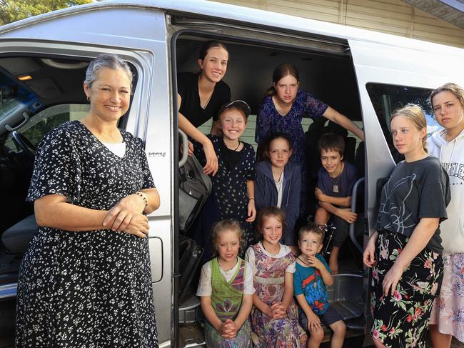 Caroline Langguth at home with kids Bridie 17, Felicity 16, Suzannah 15, Celina 13, Kateri 12, Charlotte 11, Andrew 9, Rita 8, Evelyn 6. Joey 3. Caroline is expecting her 14th child in August and as you can expect has a very busy life. Pics Adam Head