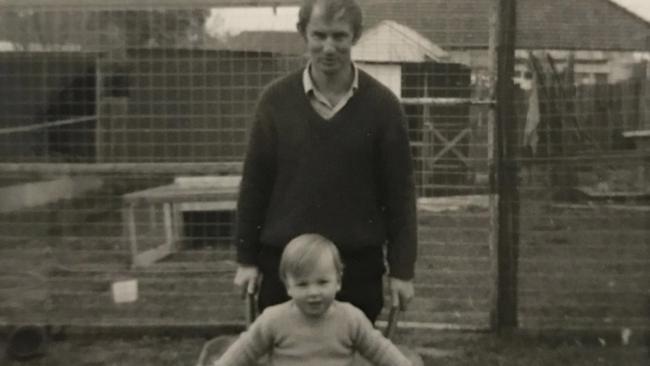 Michael Waugh as a child with his father, John.