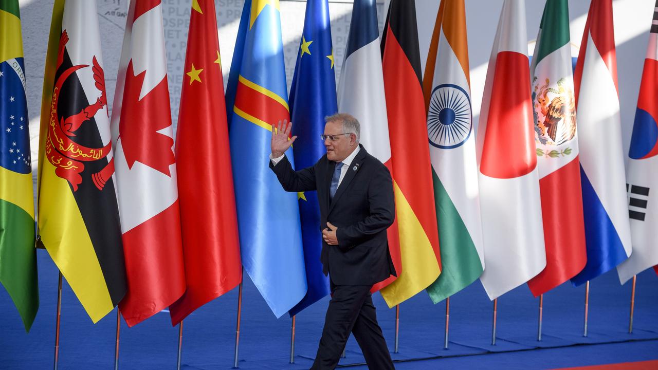 Morrison said ‘g’day’ to the French President in Rome. Picture: Antonio Masiello/Getty Images