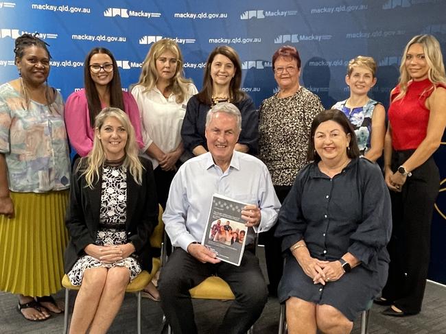 Back row (from left) Fiona Bobongie, Courtney Wilson, of Mackay, Isaac and Whitsunday Council of Mayors Suicide Prevention Taskforce Project, Carol Norris, of Greater Whitsunday Communities, Karin Baron, of NQPHN Mackay, Mackay Deputy Mayor Karen May, Deb Rae, Stephanie Zweers and (front from left) Whitsunday Mayor Julie Hall, Mackay Mayor Greg Williamson and Isaac Mayor Anne Baker at the release of the suicide prevention report on March 30, 2023, Photo: Zoe Devenport