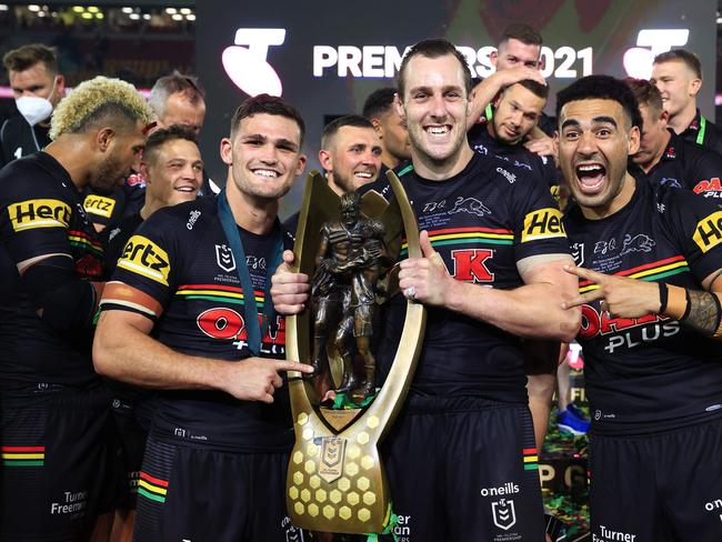 Nathan Cleary, Isaah Yeo and Tyrone May celebrate winning the 2021 NRL Grand Final between the Penrith Panthers and Souths Sydney Rabbitohs at Suncorp Stadium in Brisbane. Pics Adam Head