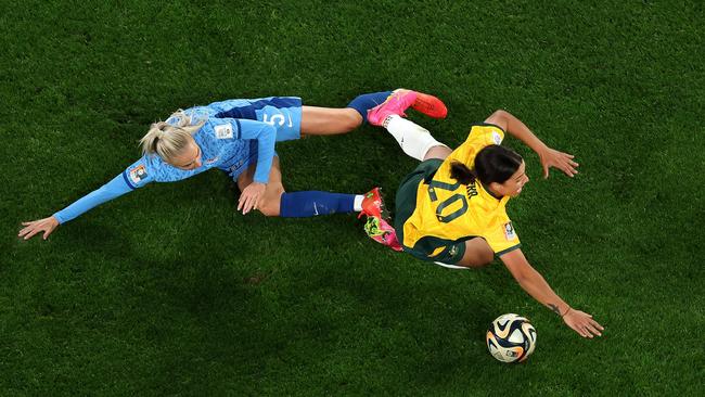 Sam Kerr is fouled by England’s Alex Greenwood in Wednesday’s semi-final. Picture: Getty Images