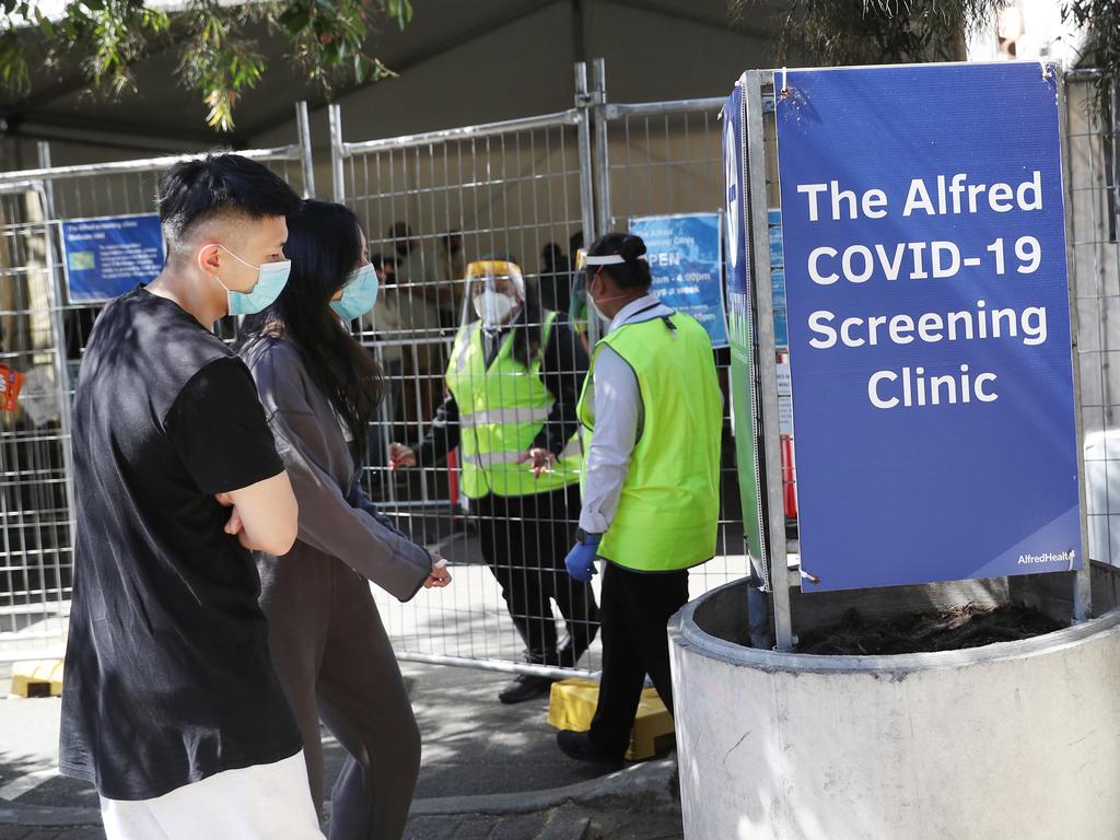 People line up at the Melbourne The Alfred Hospital for Covid testing as numbers continue to grow in Victoria. Picture: NCA NewsWire/ David Crosling